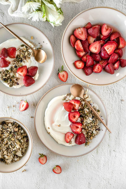 Smoothie bowl with granola and strawberries, Quebec, Canada